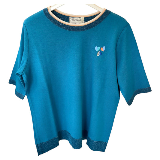 Twin set donna con fantasia in Pura Lana Merinos Extrafine. Realizzato con tessuti di prima qualità. Made in Italy. Scopri eleganza e qualità di questo prodotto nella storica maglieria di lusso Bellandi dal 1952, negozio fisico a Viareggio.